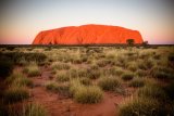 západ slunce, Uluru (Austrálie, Dreamstime)