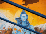 Bůh Šiva shlíží na posvátné vody řeky Gangy (Indie, Michal Čepek)